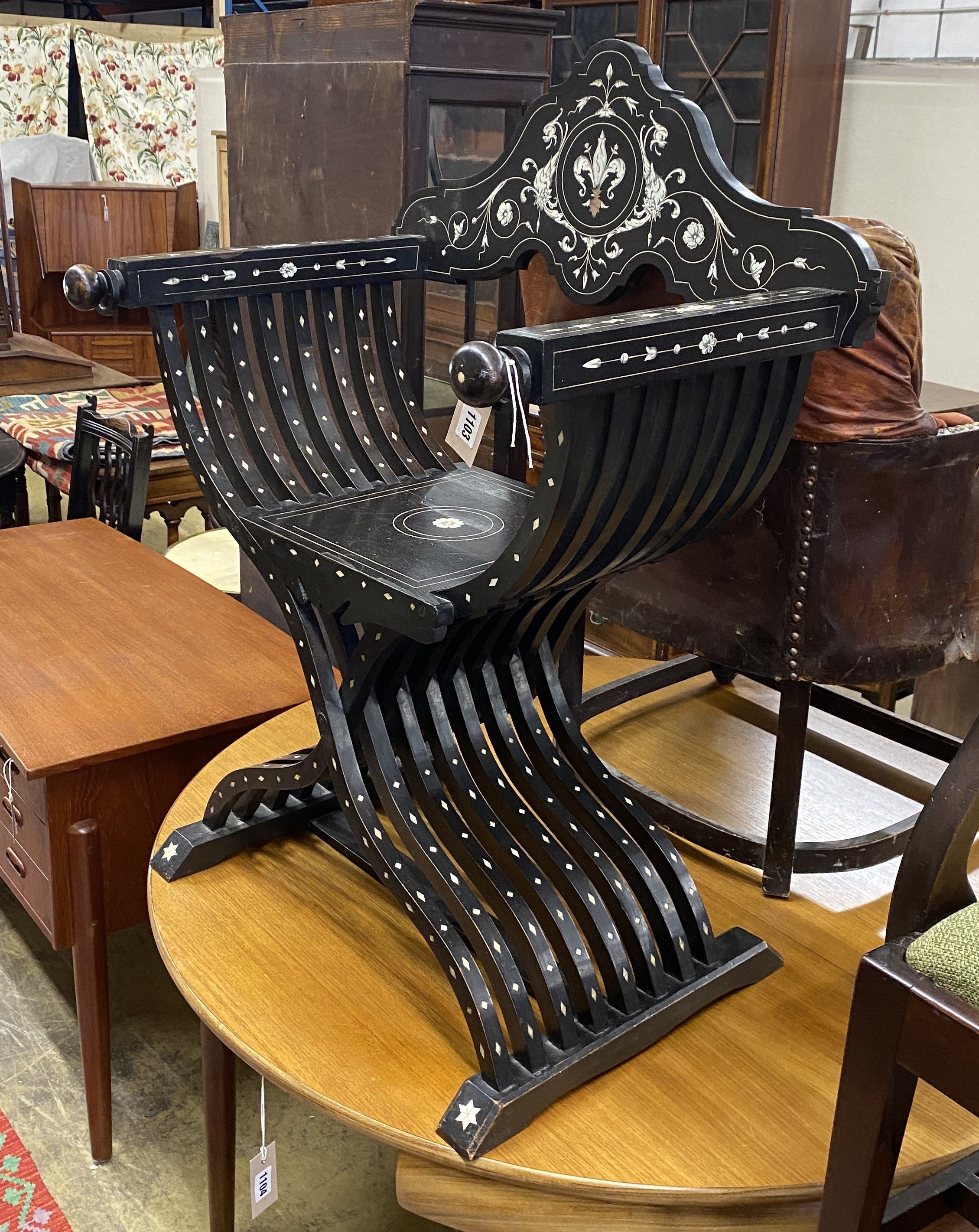 A 19th century Italian ebonised bone inlaid savonarola chair, width 72cm, depth 33cm, height 97cm